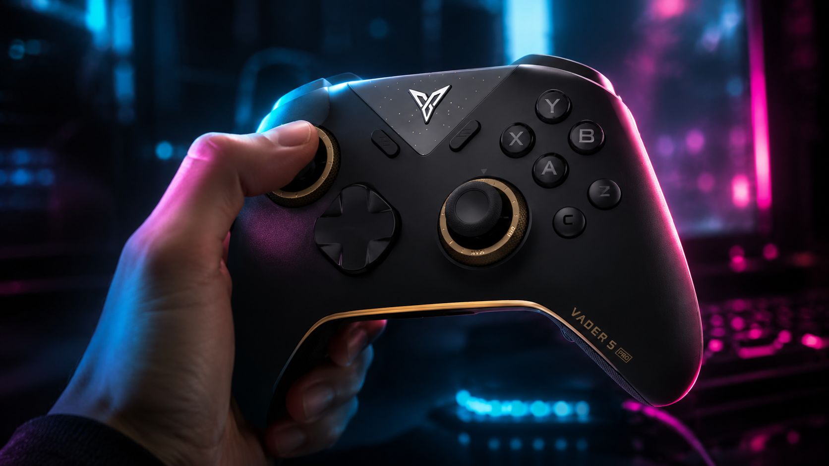 Close-up of a hand holding the Flydigi Vader 5 Pro controller during gameplay, with dramatic blue and pink neon lighting in the background.
