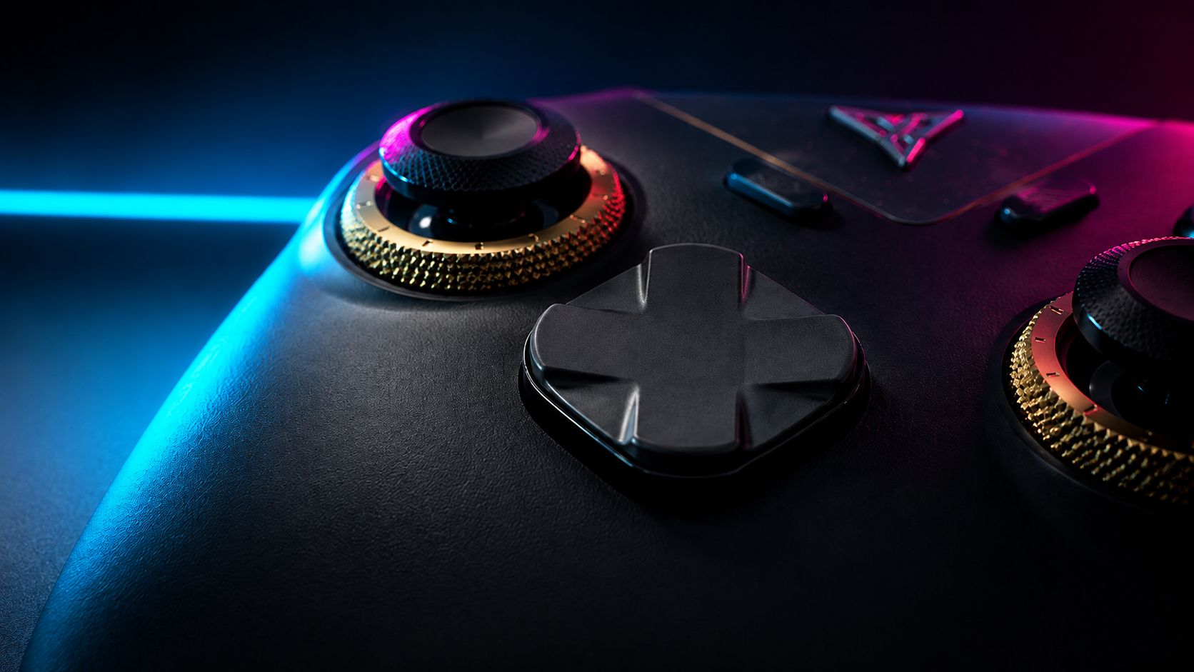 Extreme close-up of the Flydigi Vader 5 Pro D-pad and analogue sticks, photographed from a low angle with dramatic studio lighting.