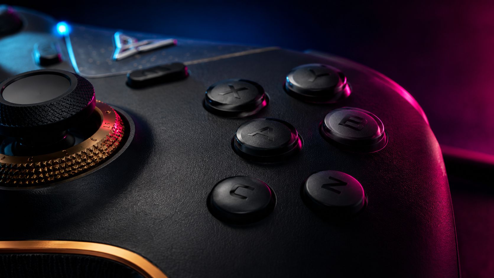 Extreme close-up of the Flydigi Vader 5 Pro face buttons, with the XYBA, C and Z buttons shown under dramatic blue and pink studio lighting.